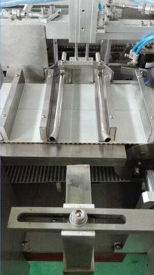 product inserting for firework packing machine